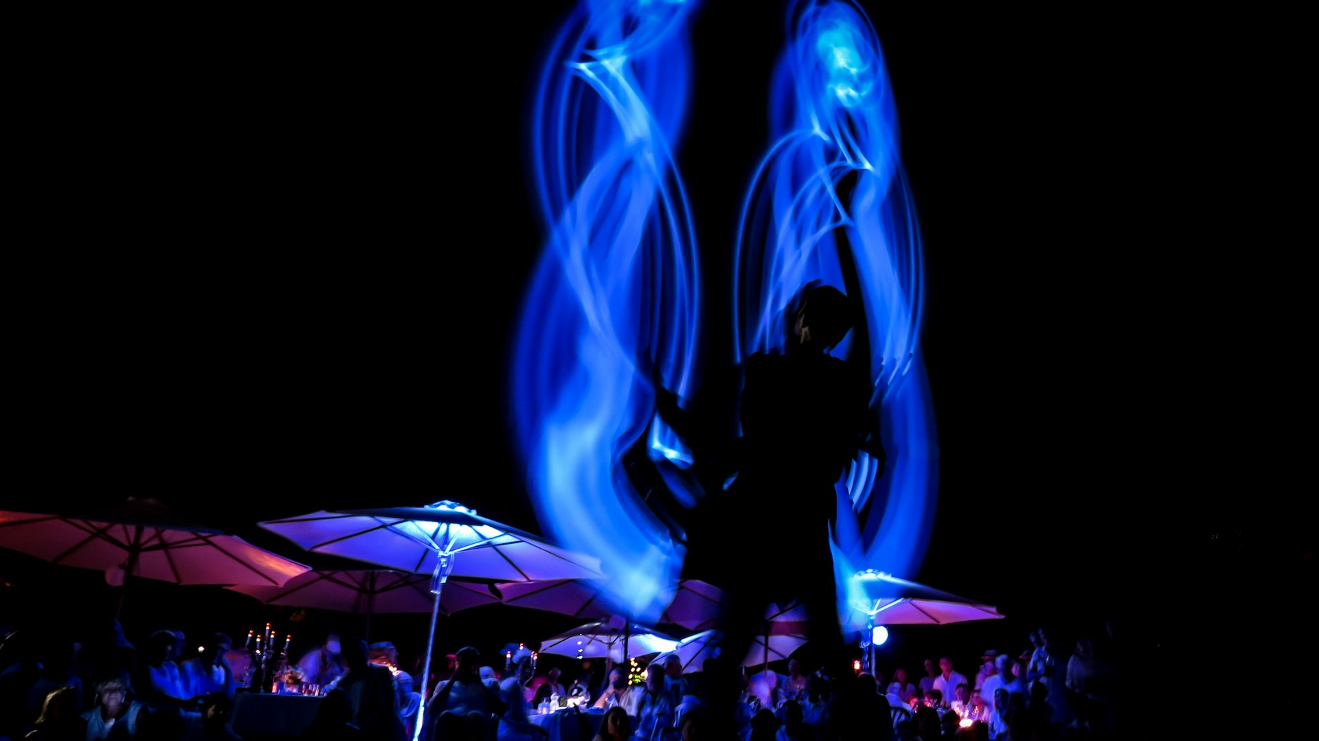 woman wearing yellow long-sleeved dress under white clouds and blue sky during daytime