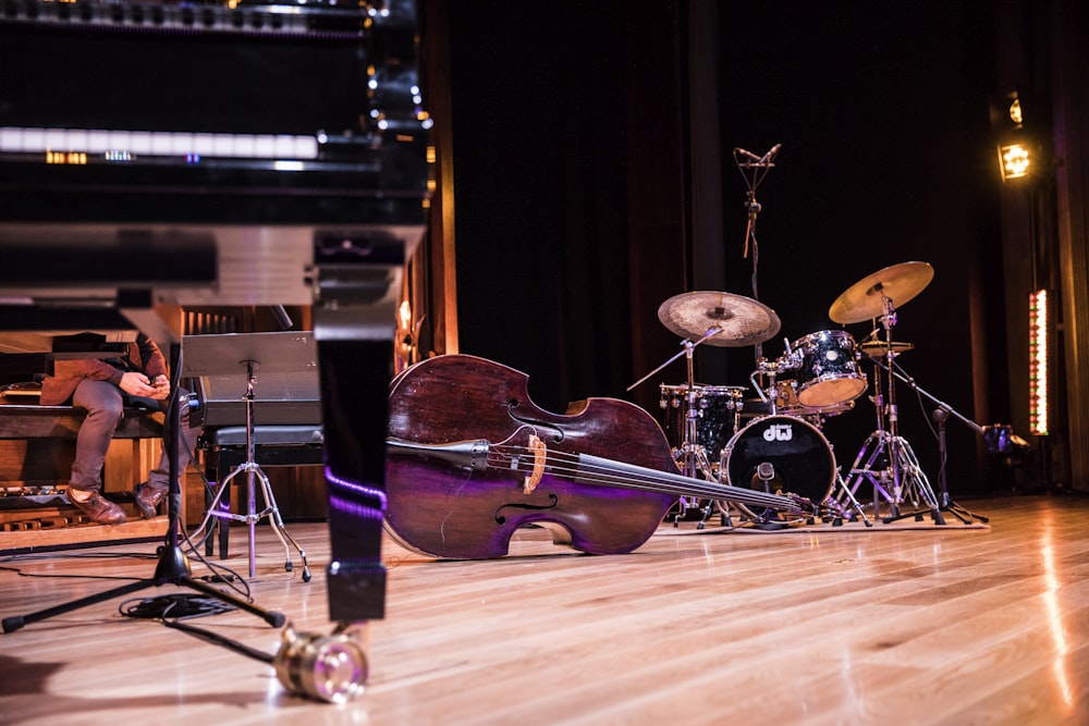 low angle photography of violin on ground