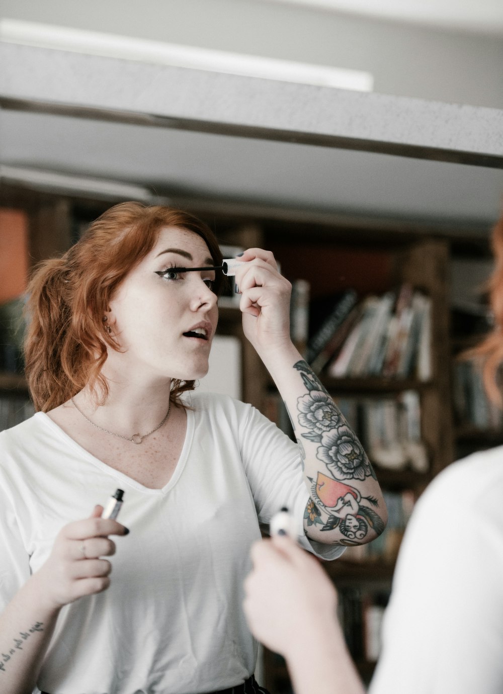 woman holding makeup rush