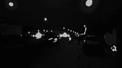 A tense small-town street scene at night, with flashing police lights hinting at a crime story.