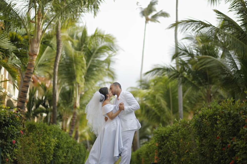 bridge and groom kissing