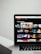 A laptop displaying the Netflix Originals section with various show thumbnails, including Stranger Things, Black Mirror, and Riverdale. The screen interface includes a list of shows available for viewing.