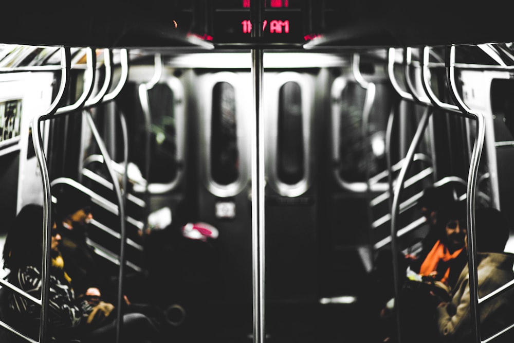 people sitting on train