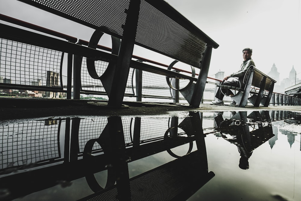 man sitting on bench