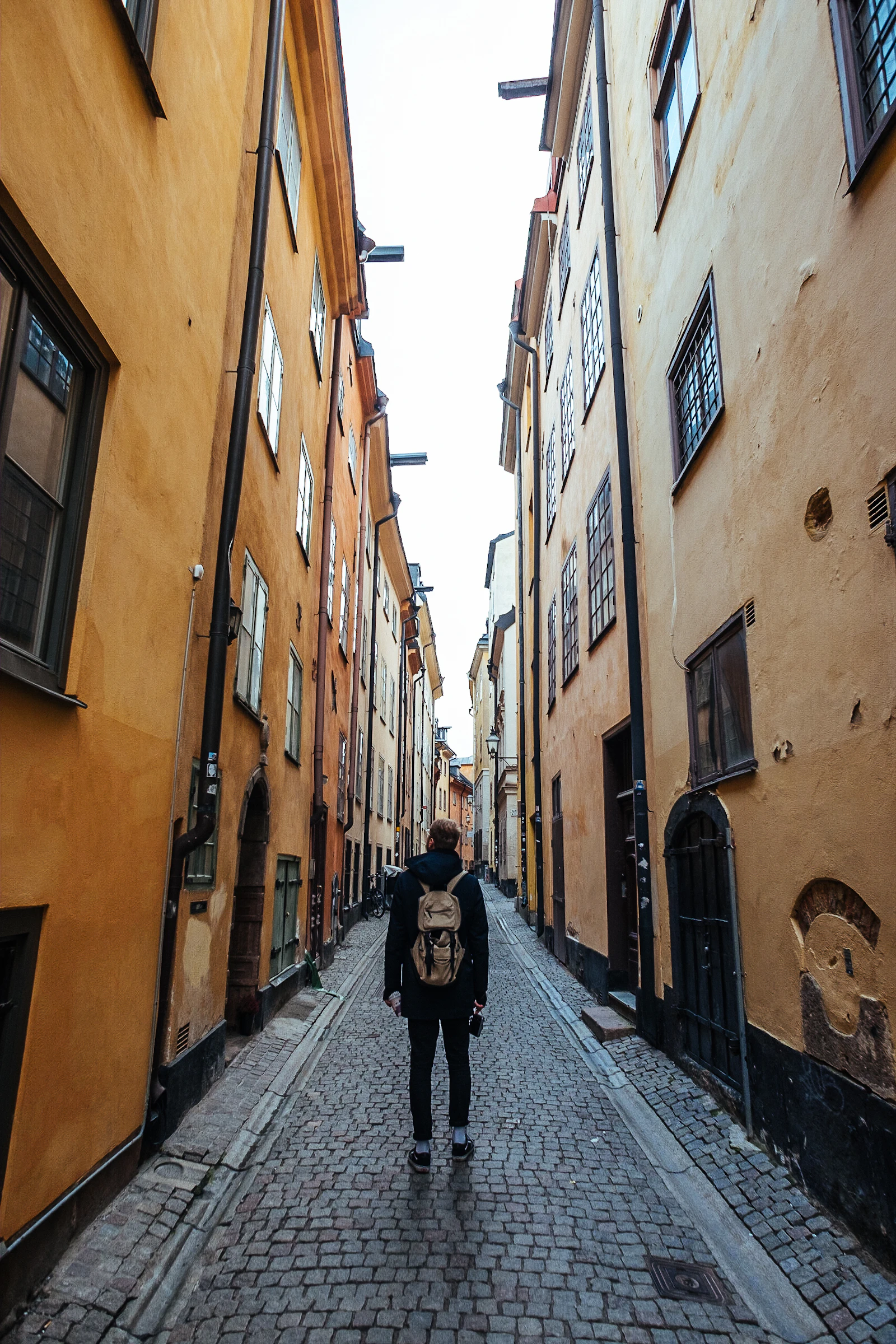 Street and traffic through central Stockholm buildings