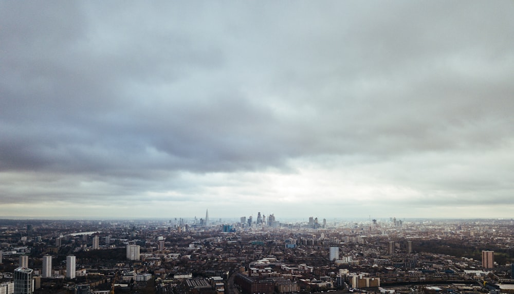 aerial photo of city during cloudy day