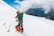 man in snow field mountain at daytime