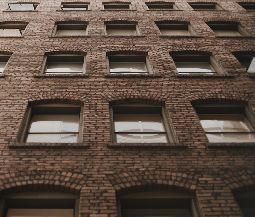 low angle photo of brown building