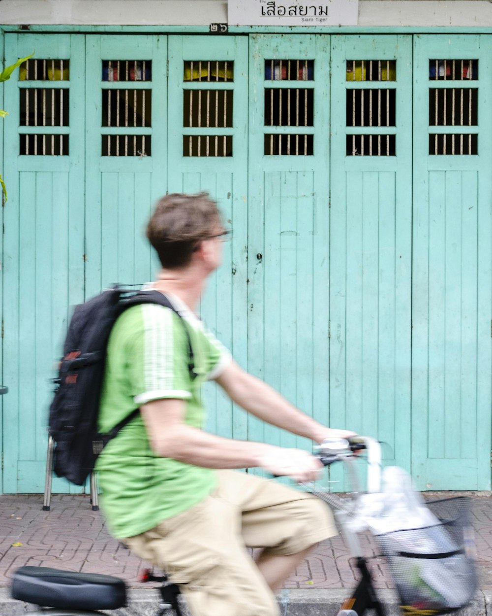 man riding on bicycle