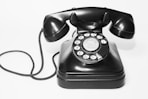 photo of black rotary telephone