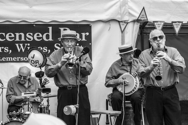 A vintage photograph of a gathering of musicians in 1898, showcasing camaraderie and determination.
