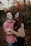 woman hugging man selective focus photography