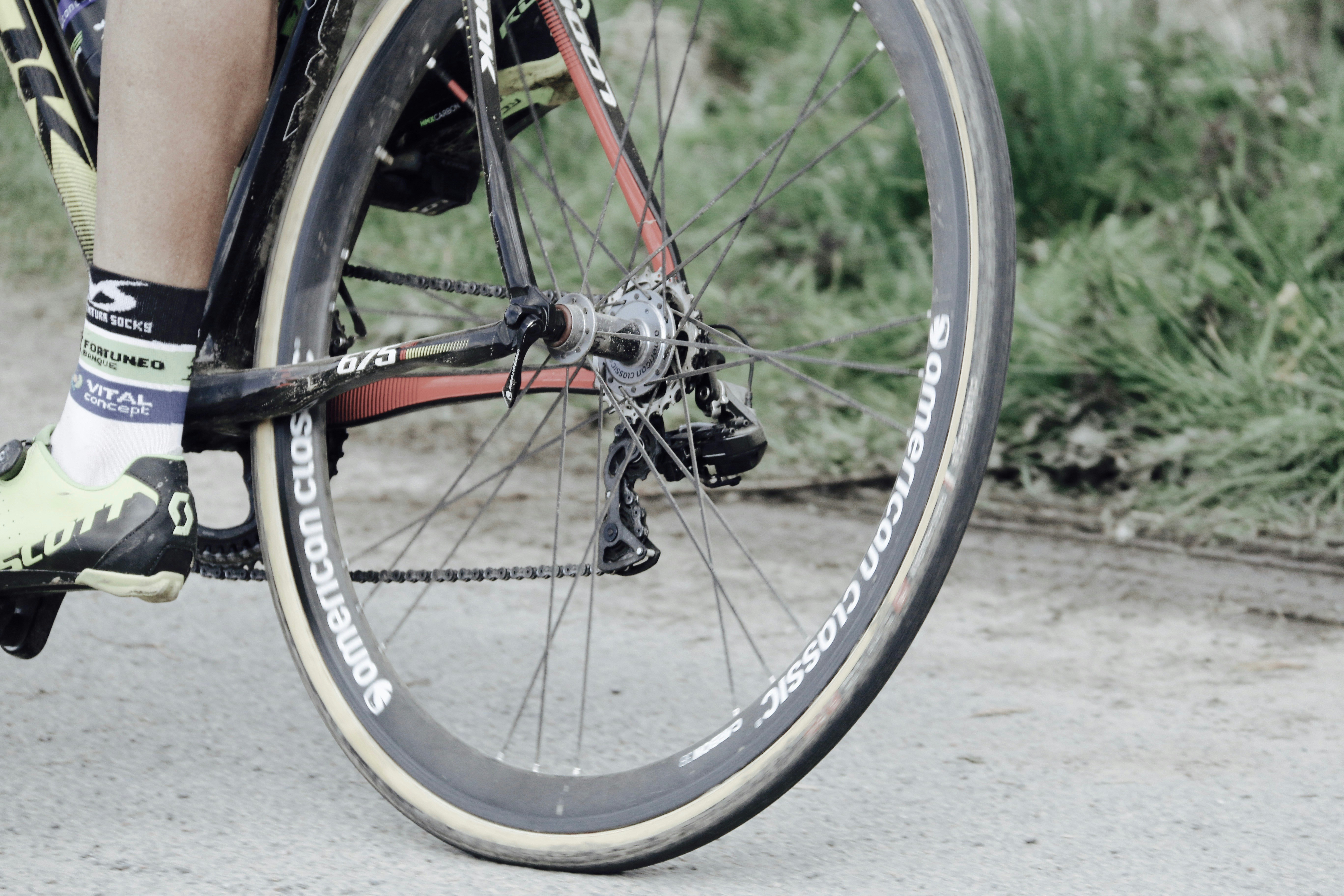 person riding black bicycle
