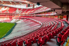 white and red stadium photo at daytime
