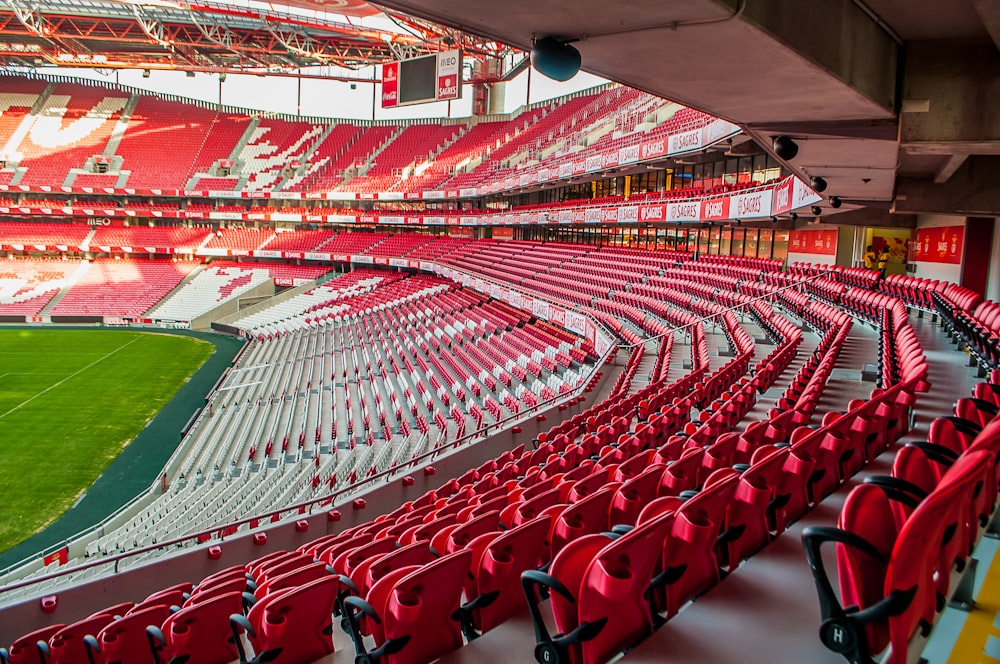 white and red stadium photo at daytime