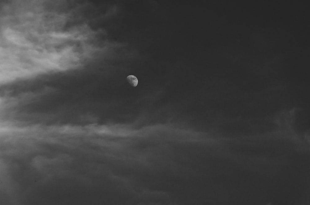 dark clouds covering moon