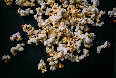 popcorn on black panel popcorn string teams background