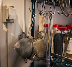 kitchen utensils hanging on hook