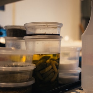 liquid filled plastic containers inside storage rack