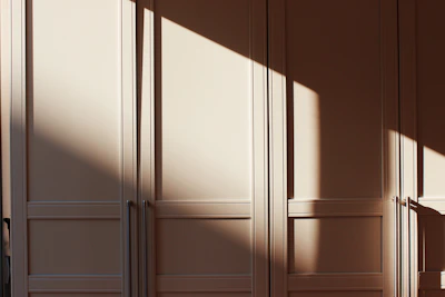 Sunlight reflecting off solar panels forming a pattern of light and shadow.