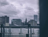 A cityscape showing government buildings under a cloudy sky.