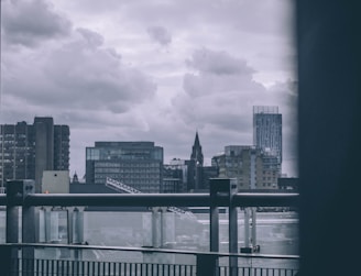 A cityscape showing government buildings under a cloudy sky.