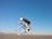 man riding on gray road bicycle during daytime