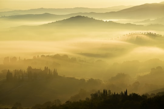 landscape photography of foggy mountains in Montescudaio Italy