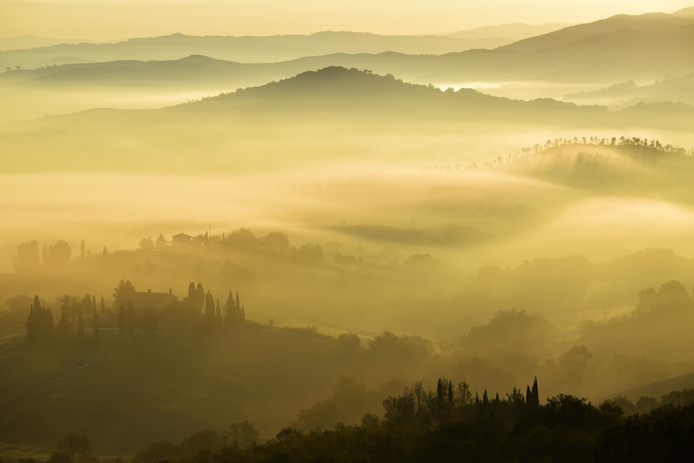 landscape photography of foggy mountains