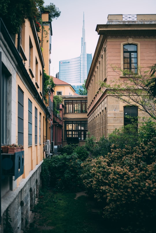 photo of houses surrounded by plants and flowers in Milan Italy