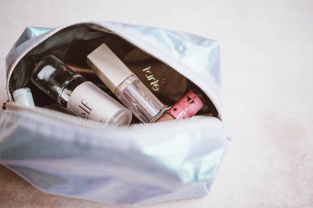 cosmetics in gray bag