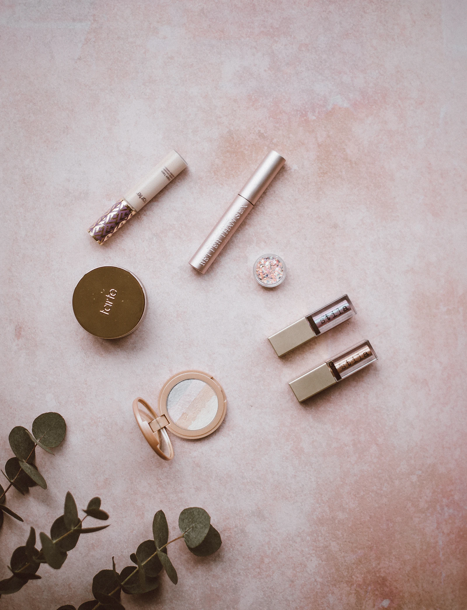 Assorted beauty and cosmetic products arranged for comparison