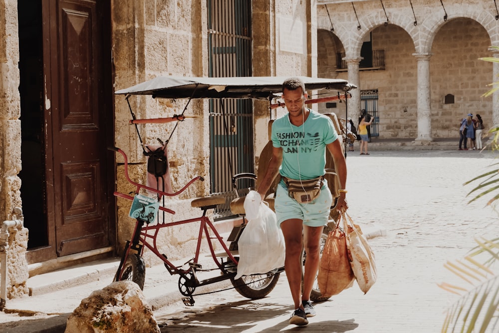 man carrying bag