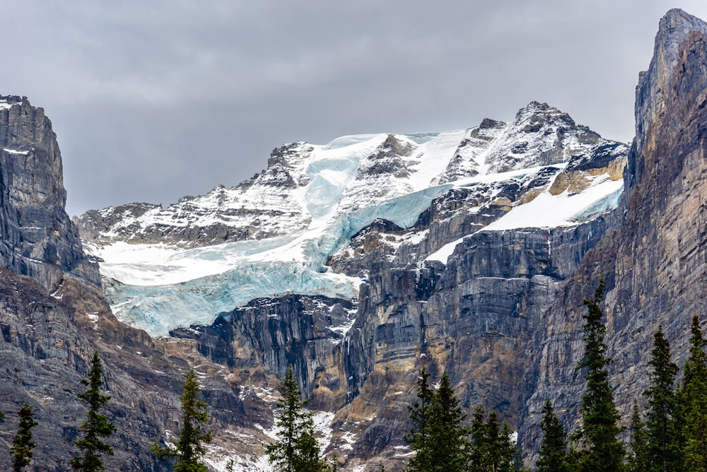 rocky mountain under gray sky