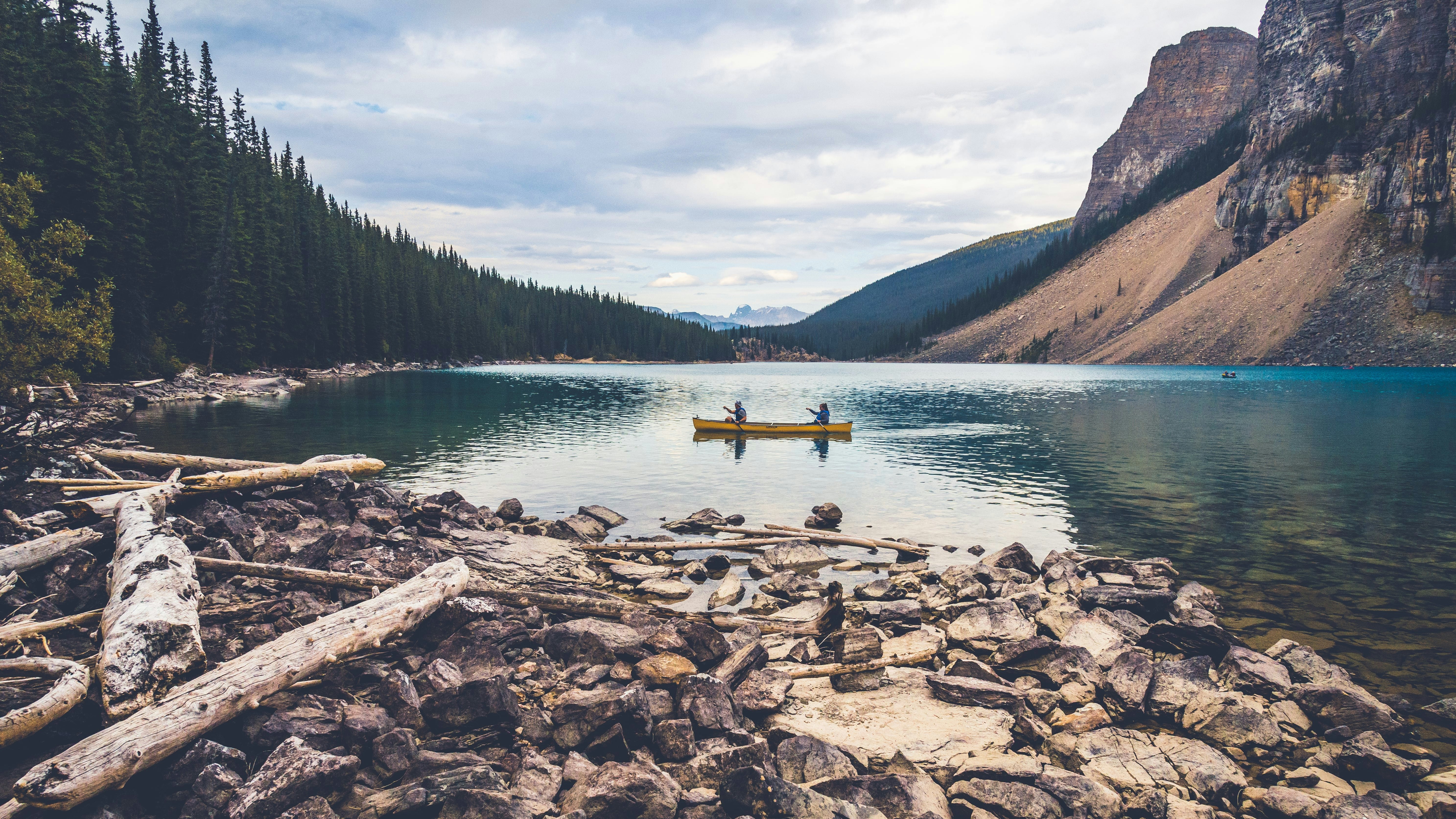 person riding on in boat in body of water