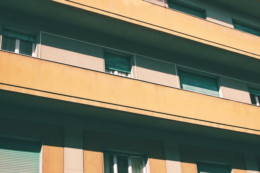 brown and beige painted building