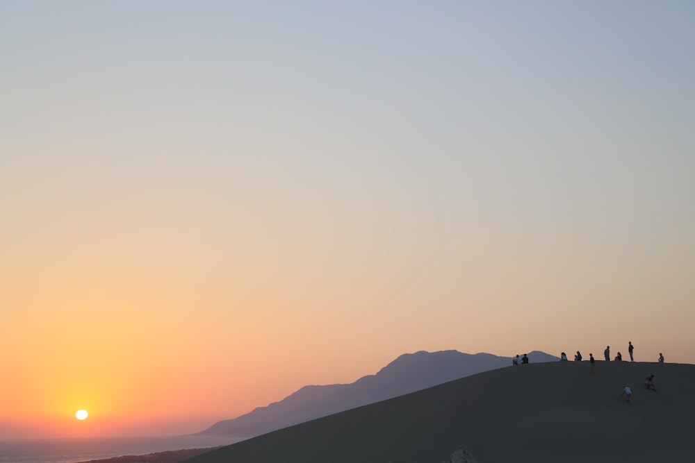 golden hour photo of mountain ranges