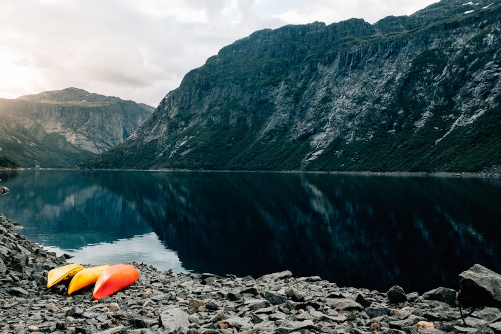 mountain near body of water during daytime