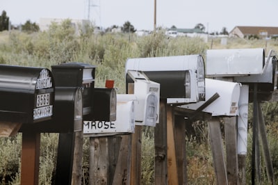 letterbox near grass field receive zoom background