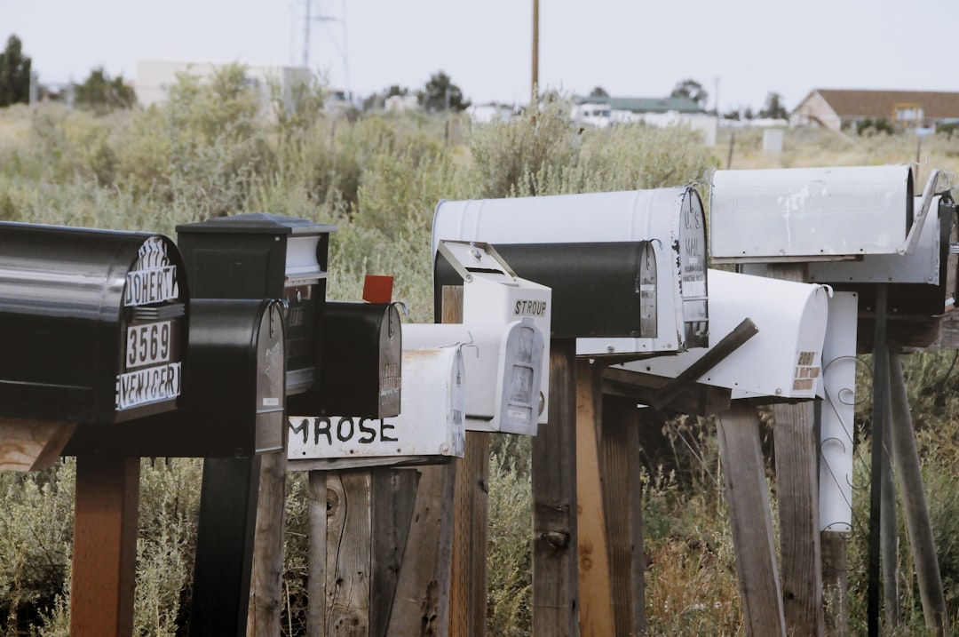 Lots of Mail boxes on the side of a road -  Customer Lifetime Value – Photo by Yannik Mika | best digital marketing - London, Bristol and Bath marketing agency