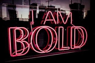 I Am bold neon signage at night time