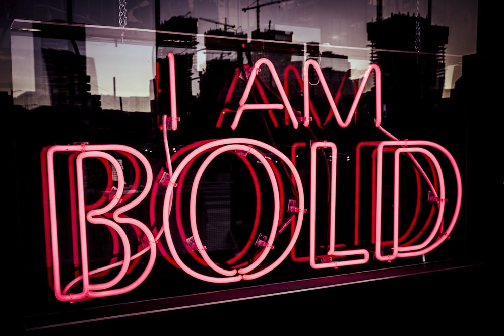 I Am bold neon signage at night time