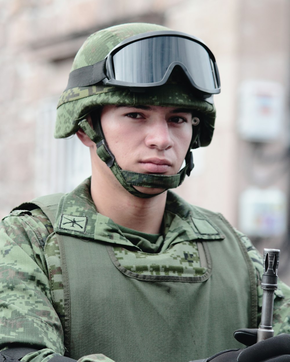 man with battle helmet and goggle