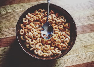 cereal dish on brown wooden surface