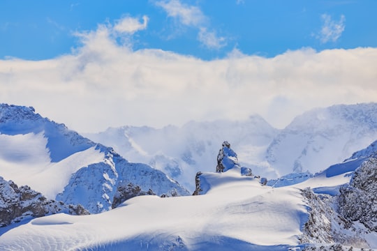 snow-covered mountain under blue sky in Klein Titlis Switzerland