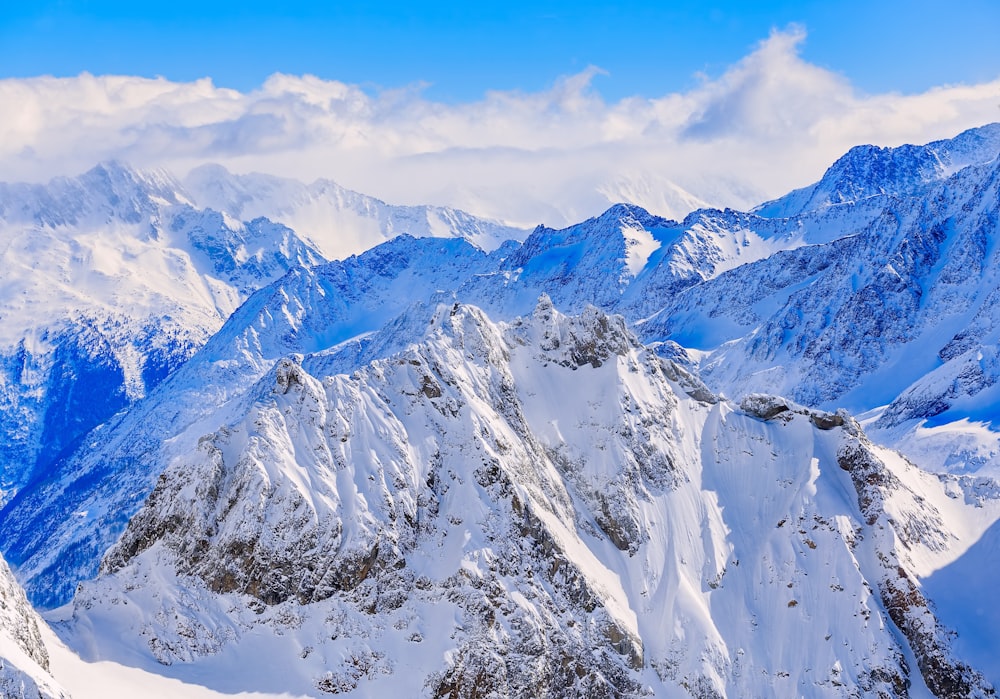 aerial view of mountain coated snow