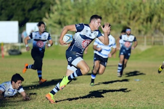 team playing rugby sport