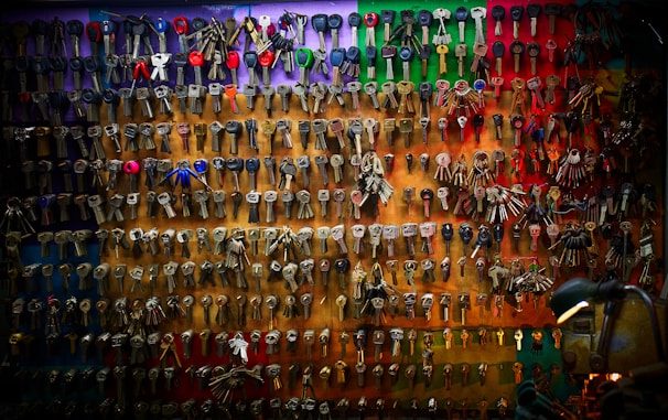 An array of keys displayed on a workbench.