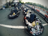 A group of friends enjoying a fun day at the karting track.