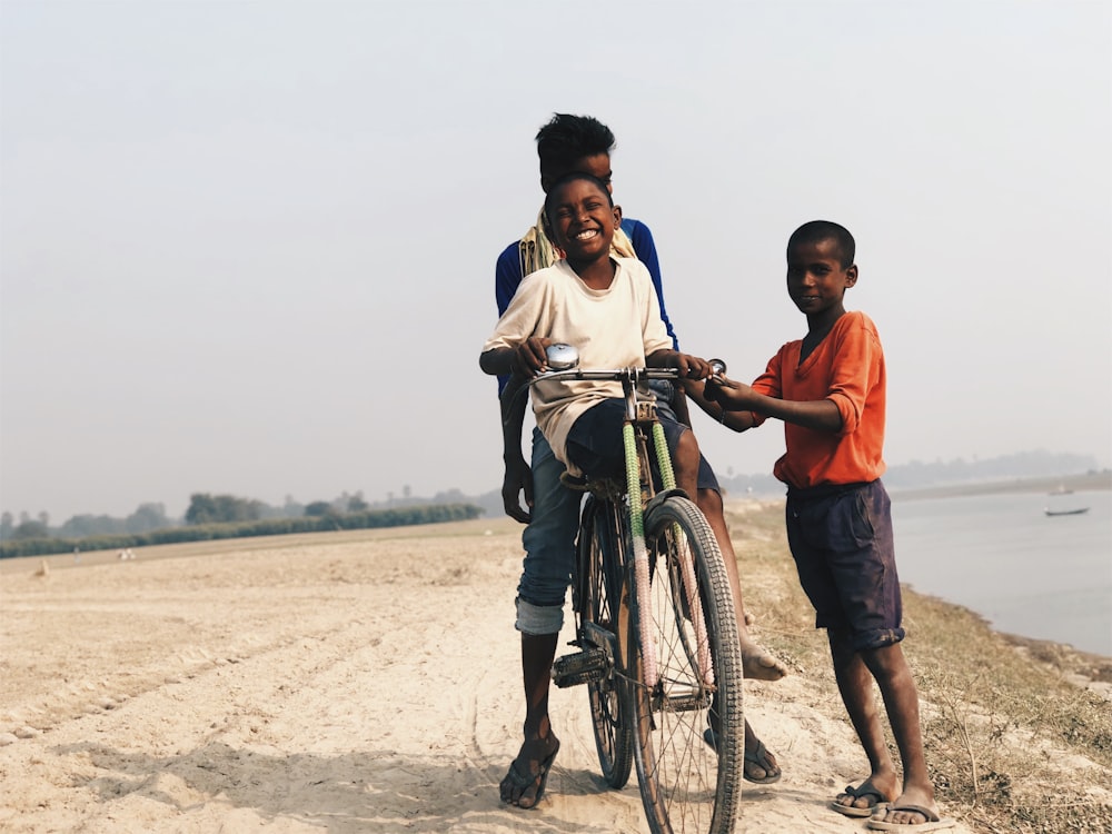 boy riding on bike